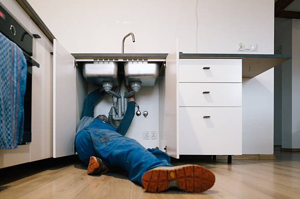 Professional Drain Cleaning technician working in Cassville, WV